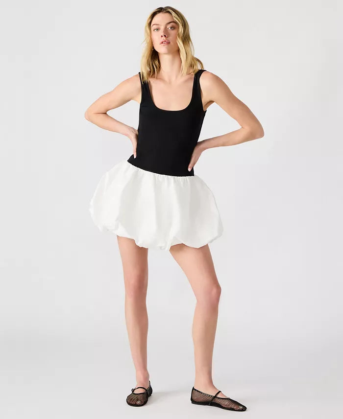 Woman wearing a black tank top STMT BOUTIQUE