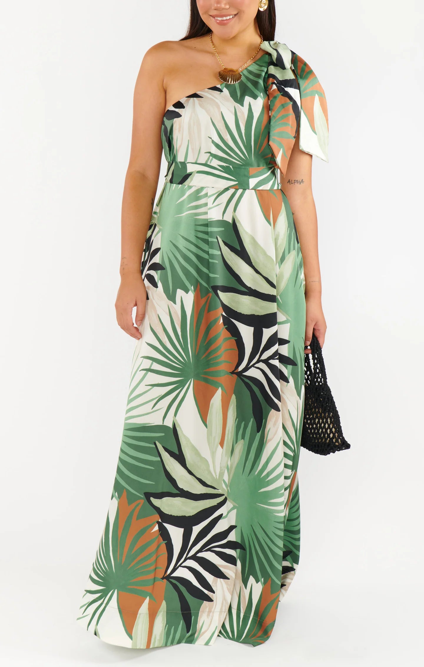 Woman wearing a one-shoulder dress
