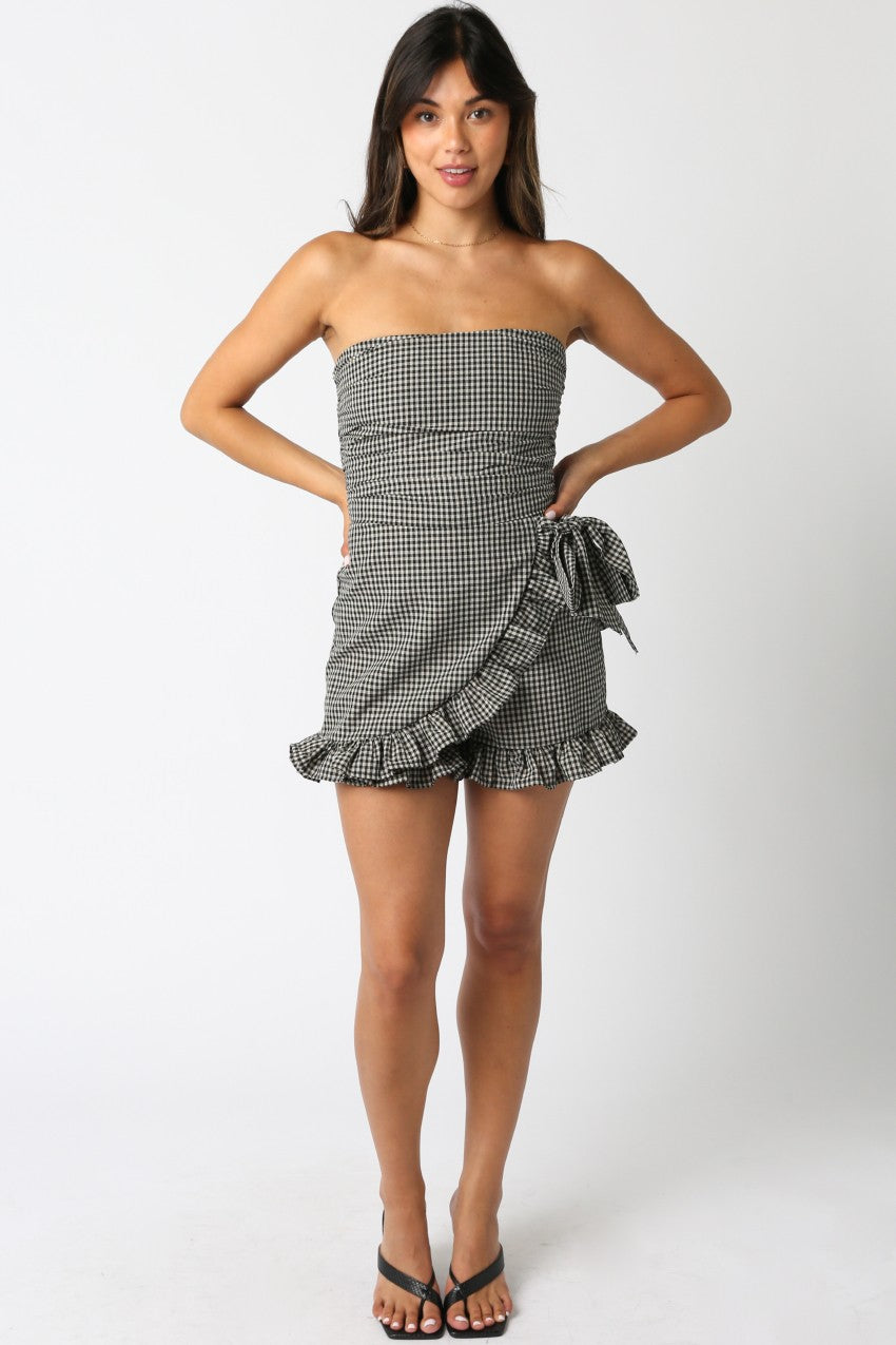 KIRSTEN CHECKERED ROMPER at STMT BOUTEEQ. Features classic checkered print, comfortable