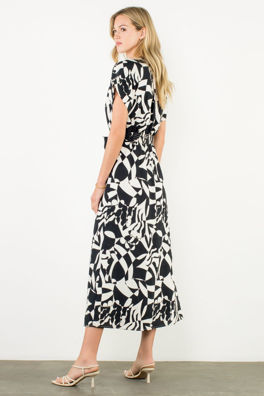 short sleeve button up dress styled with heels elegant vibe