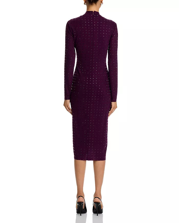 Purple dress with long sleeves and a high neckline on a white background