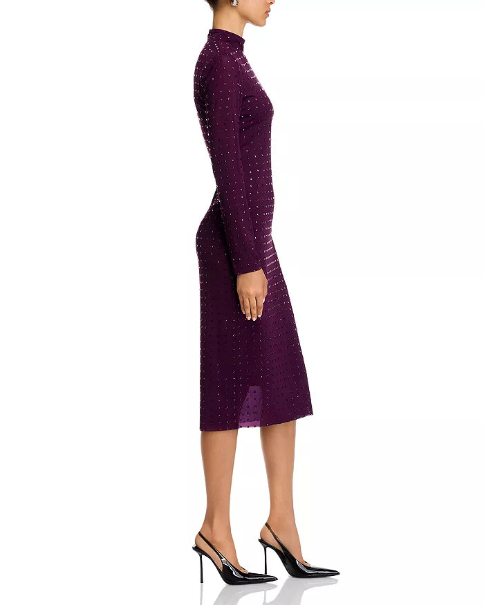 Purple dress worn by a model on a white background