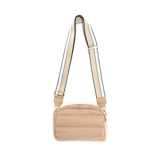 Beige crossbody bag with a strap on a white background