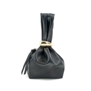 Black leather handbag with a gold clasp on a white background