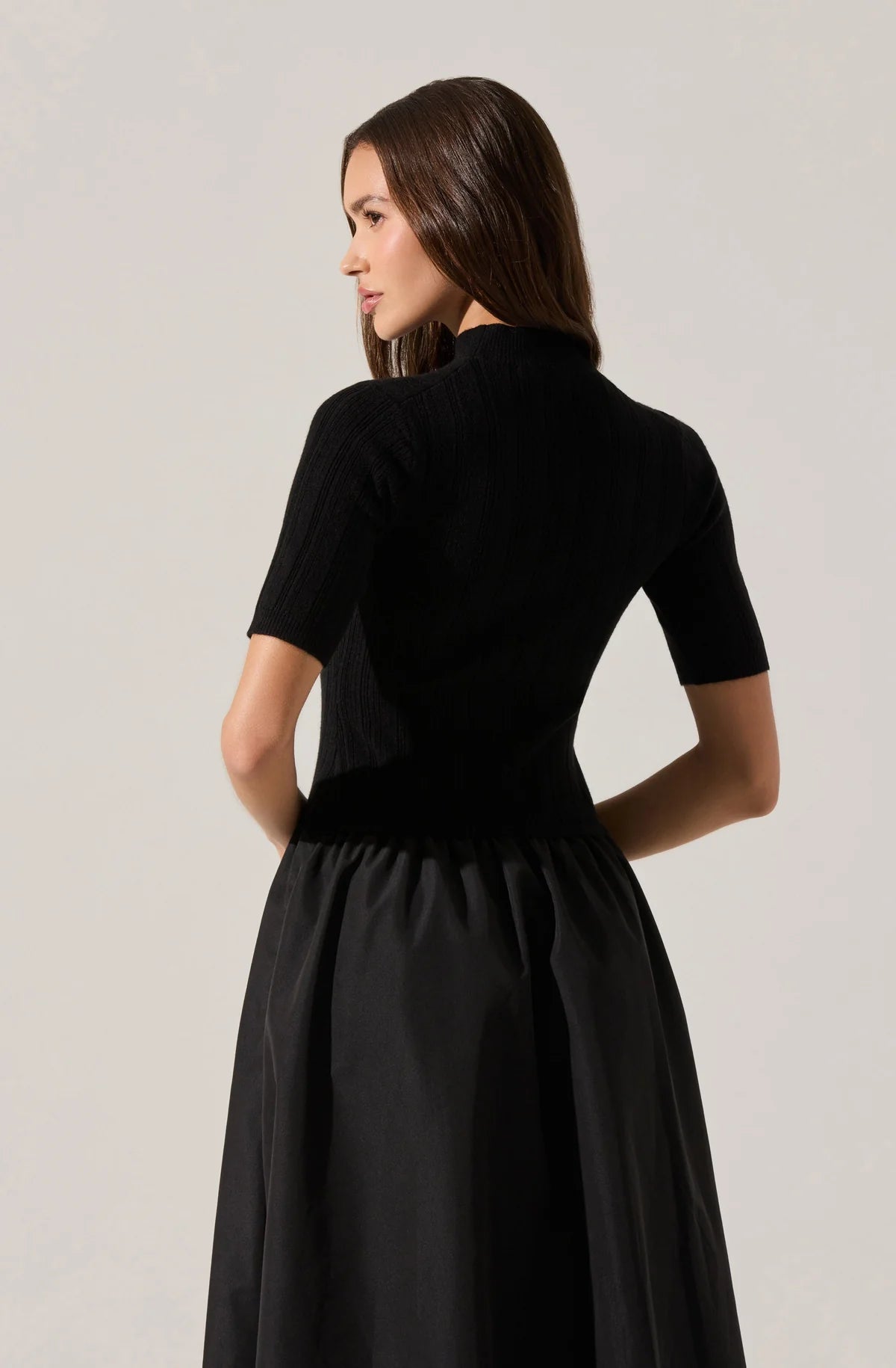 Woman wearing a black dress