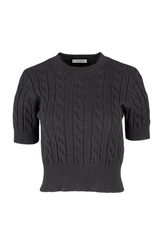 Dark gray cable knit sweater on a white background