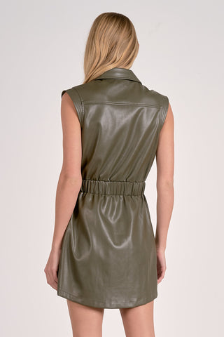 Green leather dress worn by a person on a white background