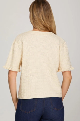 RUFFLED SHORT SLEEVE SWEATER TOP WITH FRONT POCKETS