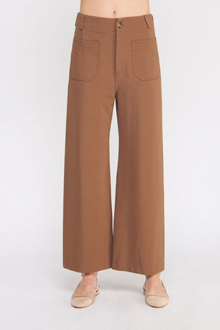Brown wide-leg pants on a white background