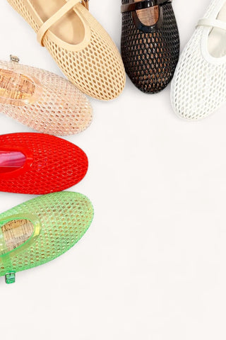 Colorful mesh shoes on a white background