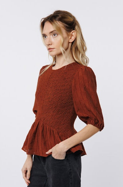 SMOCKED PEPLUM TOP