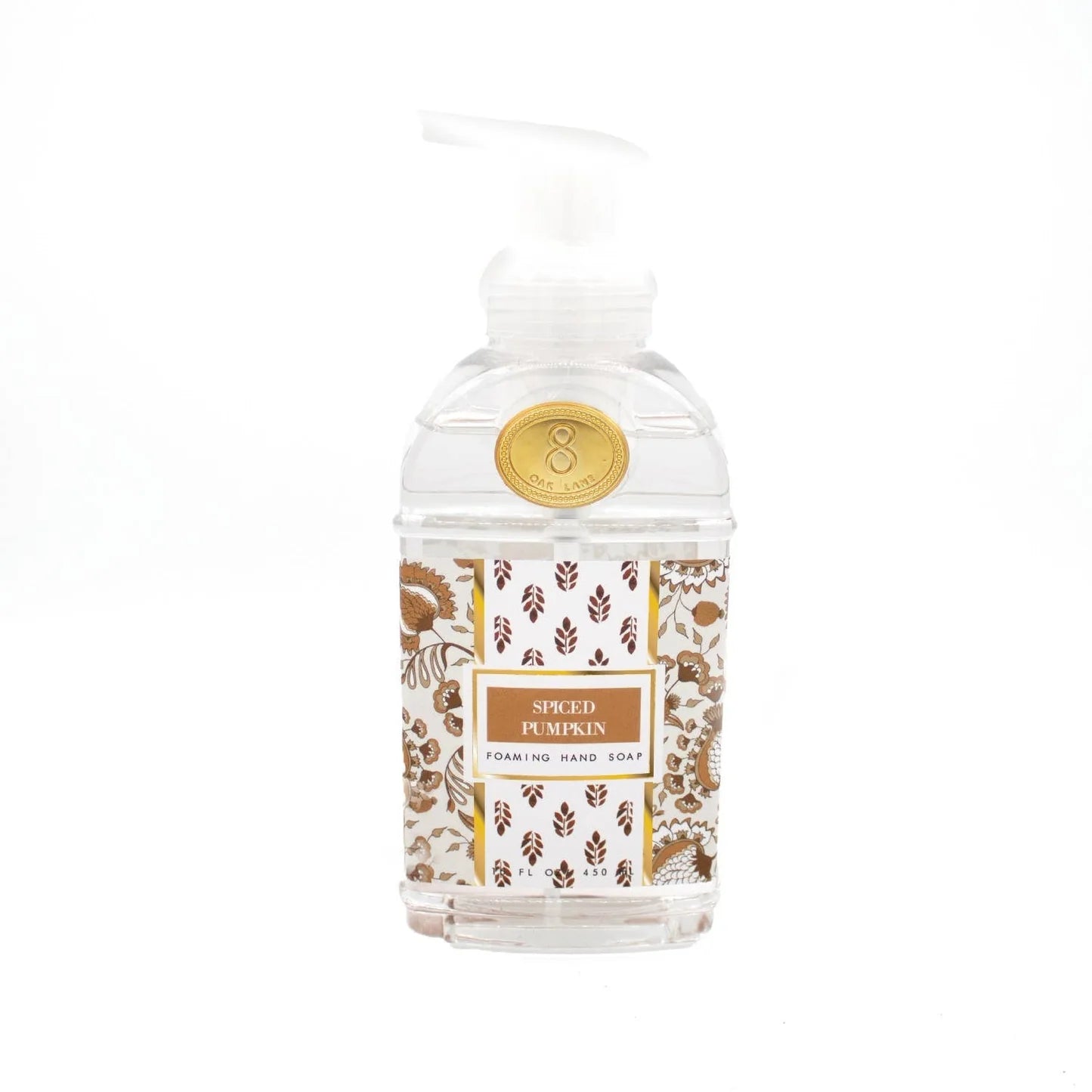 Foaming hand soap bottle with decorative label on a white background