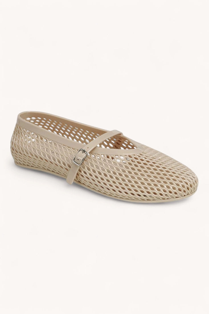 Beige mesh flat shoe on a white background