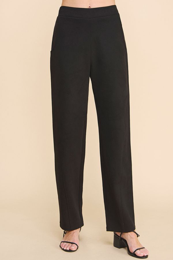 Black pants on a beige background