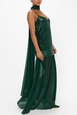 Green sequin evening gown on a white background