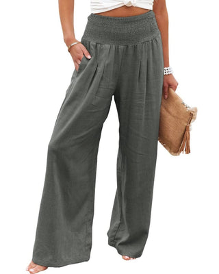 A pair of mid-rise, wide-leg gray cotton slacks with a smocked waistband STMT BOUTIQUE 
