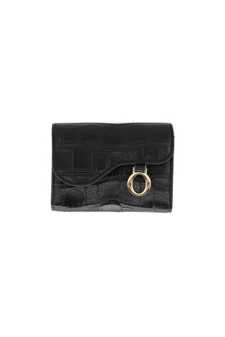 Black suede clutch with a gold ring on a white background