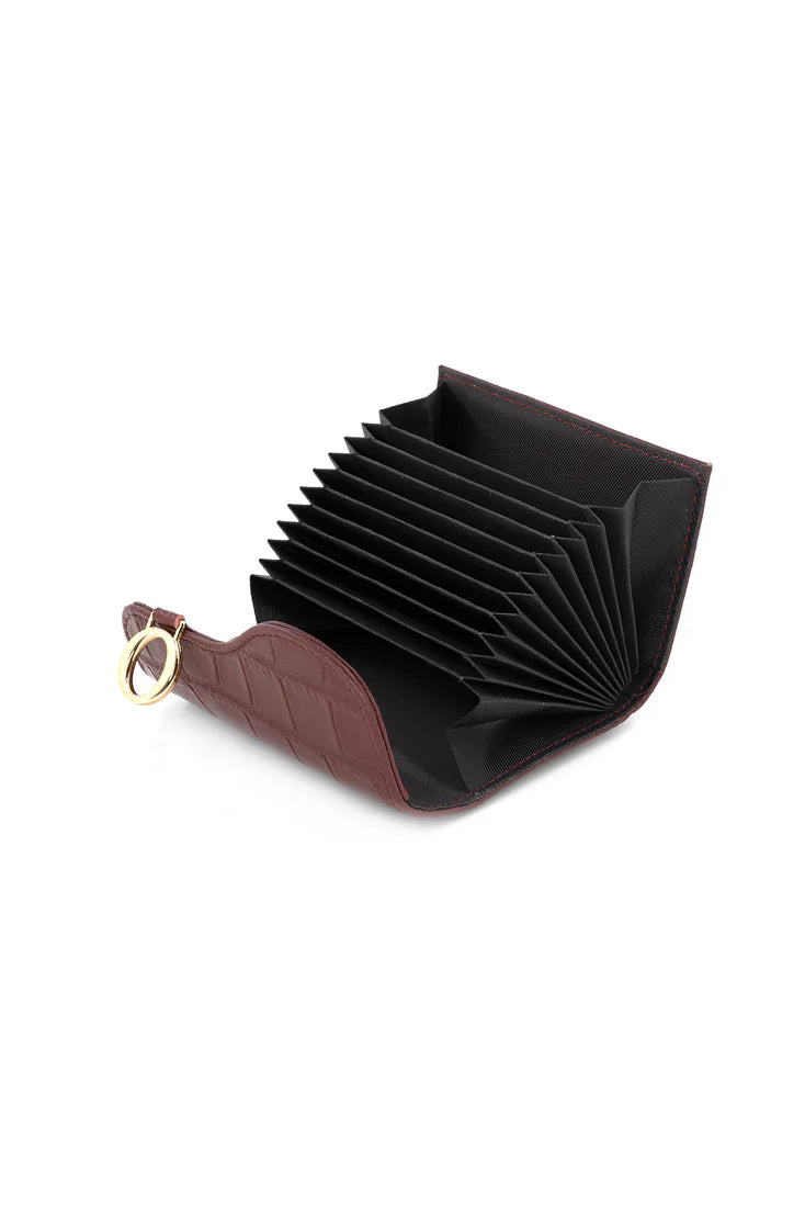 Black accordion wallet with brown leather strap on a white background