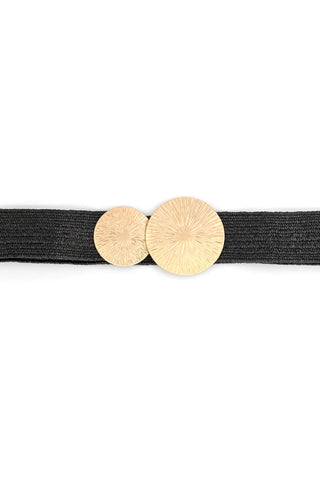 Black belt with gold circular buckles on a white background