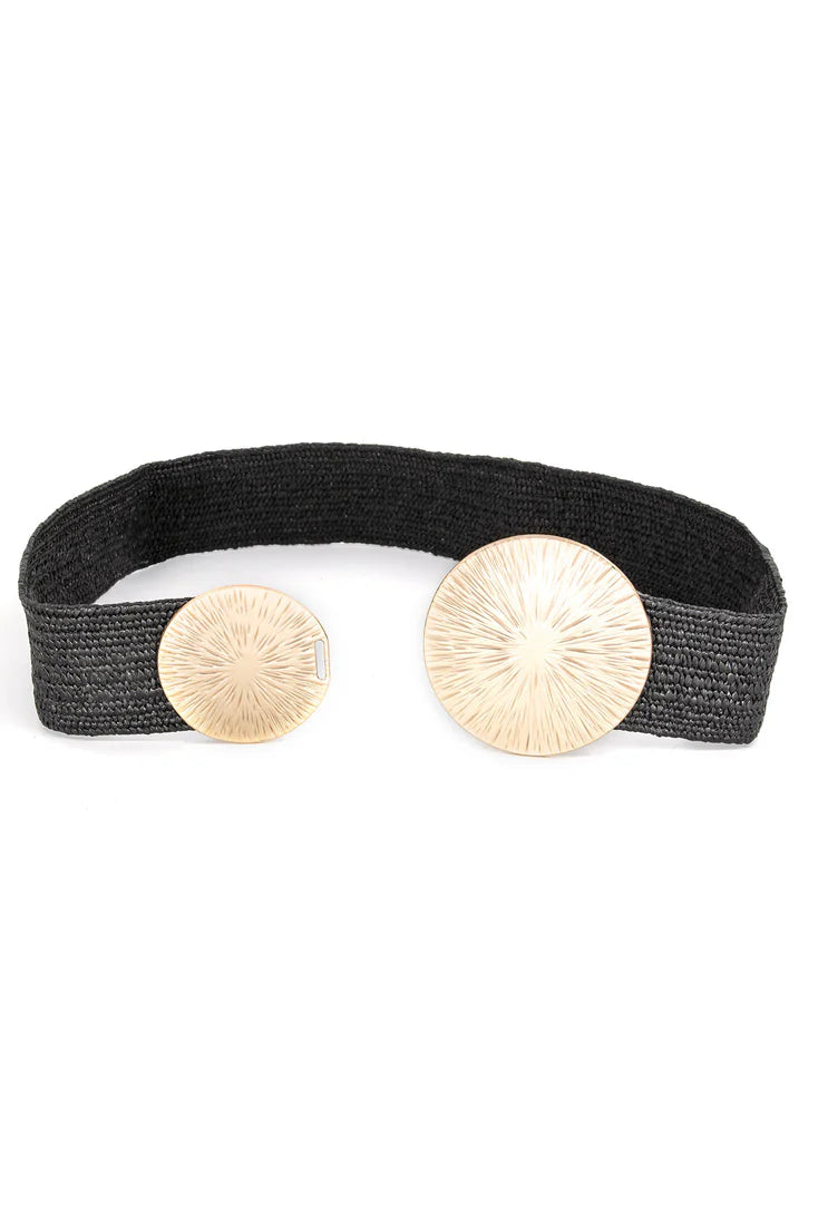 Black belt with gold circular buckles on a white background