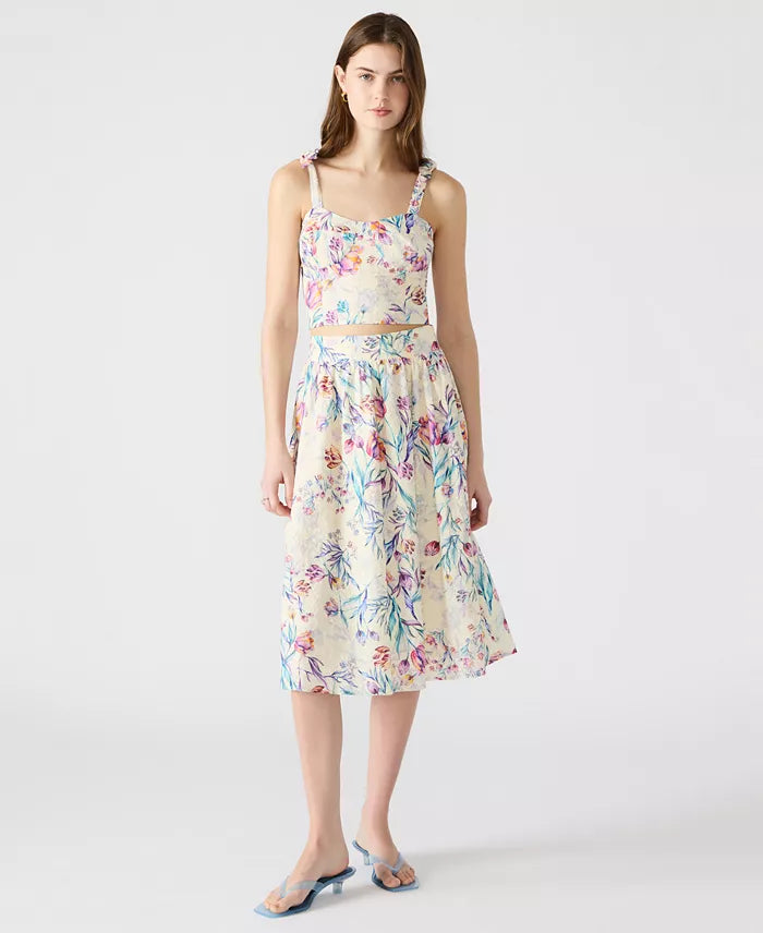 Carlynn top on hanger showing soft fabric and tailored design