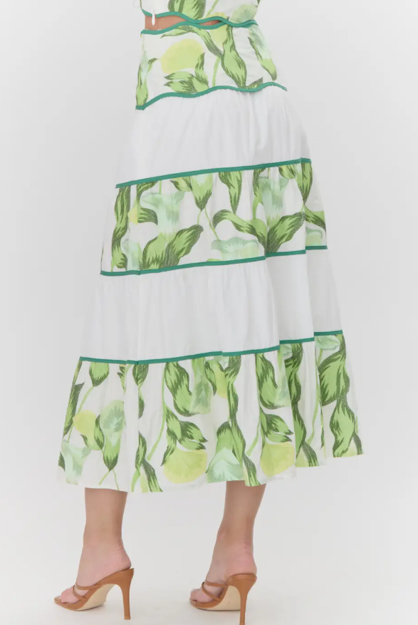 A midi-length, tiered skirt with a floral pattern STMT BOUTIQUE 