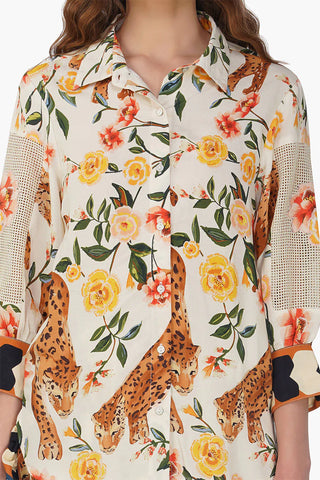 Floral and leopard print shirt with a white background