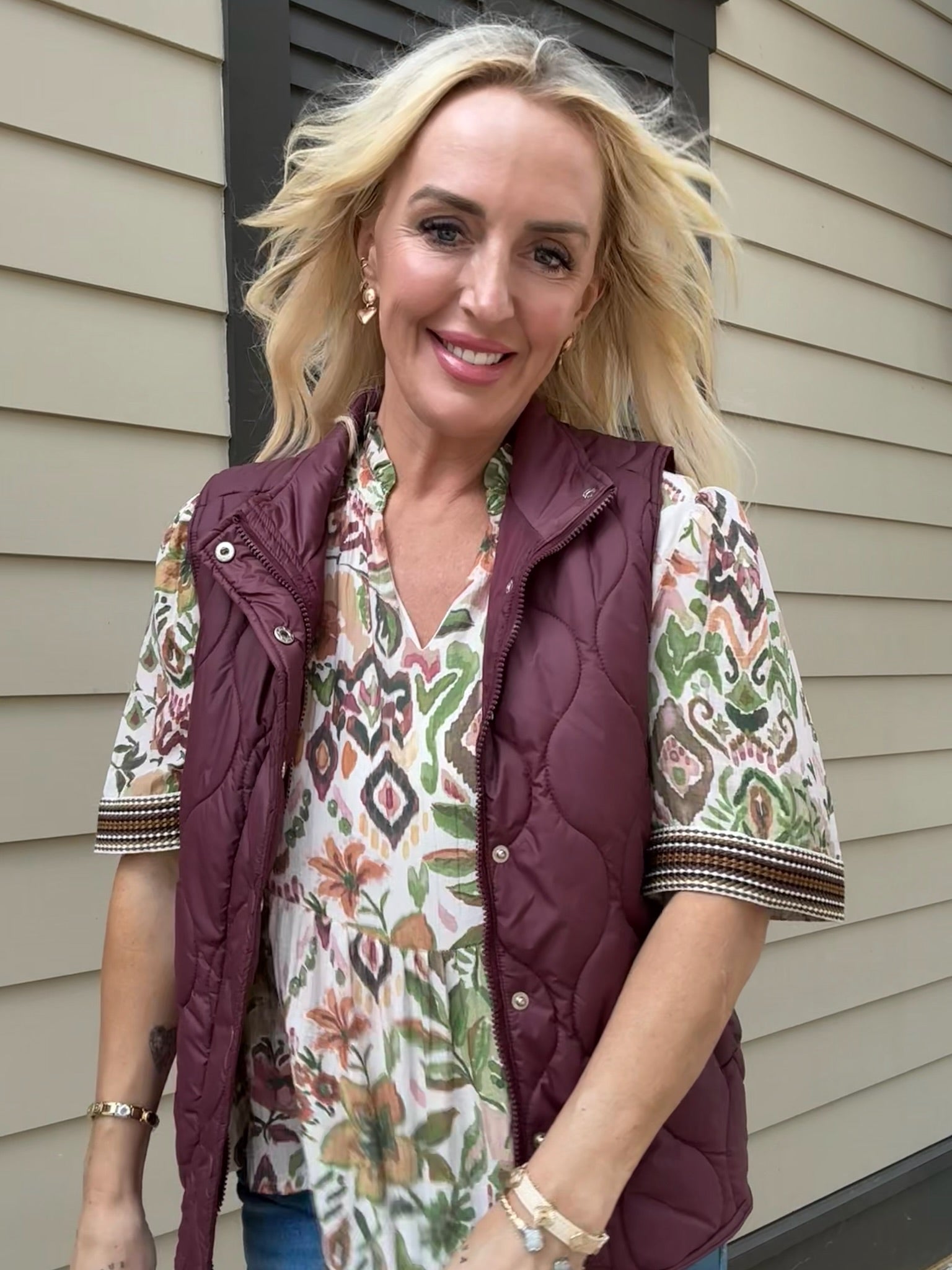 Experience versatile warmth with STMT Boutique's Isla Quilted Snap Vest