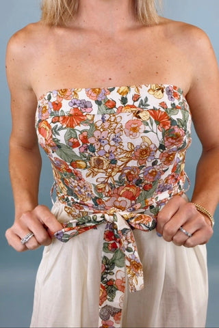 BOTANICAL PRINT BELTED PLEATED JUMPSUIT WITH POCKETS