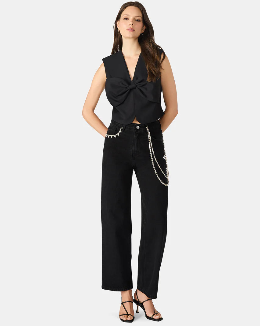 This comfortable top features feminine styling 