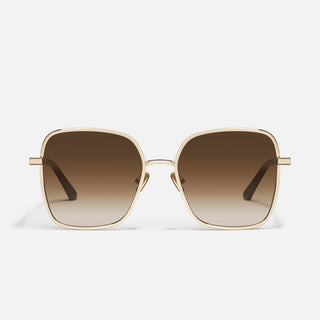 A pair of gold-colored oversized square sunglasses with tapered arms and a beveled metal frame.
