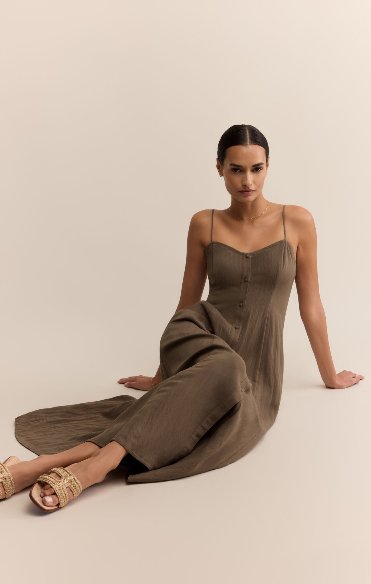 Woman wearing ANGEL EYES midi dress STMT BOUTIQUE 