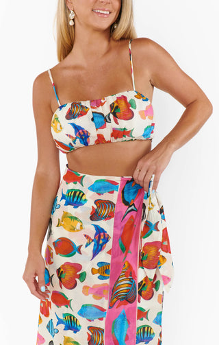 Woman wearing a colorful fish-patterned bikini set STMT BOUTIQUE 