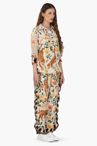 Woman wearing a floral and animal print dress