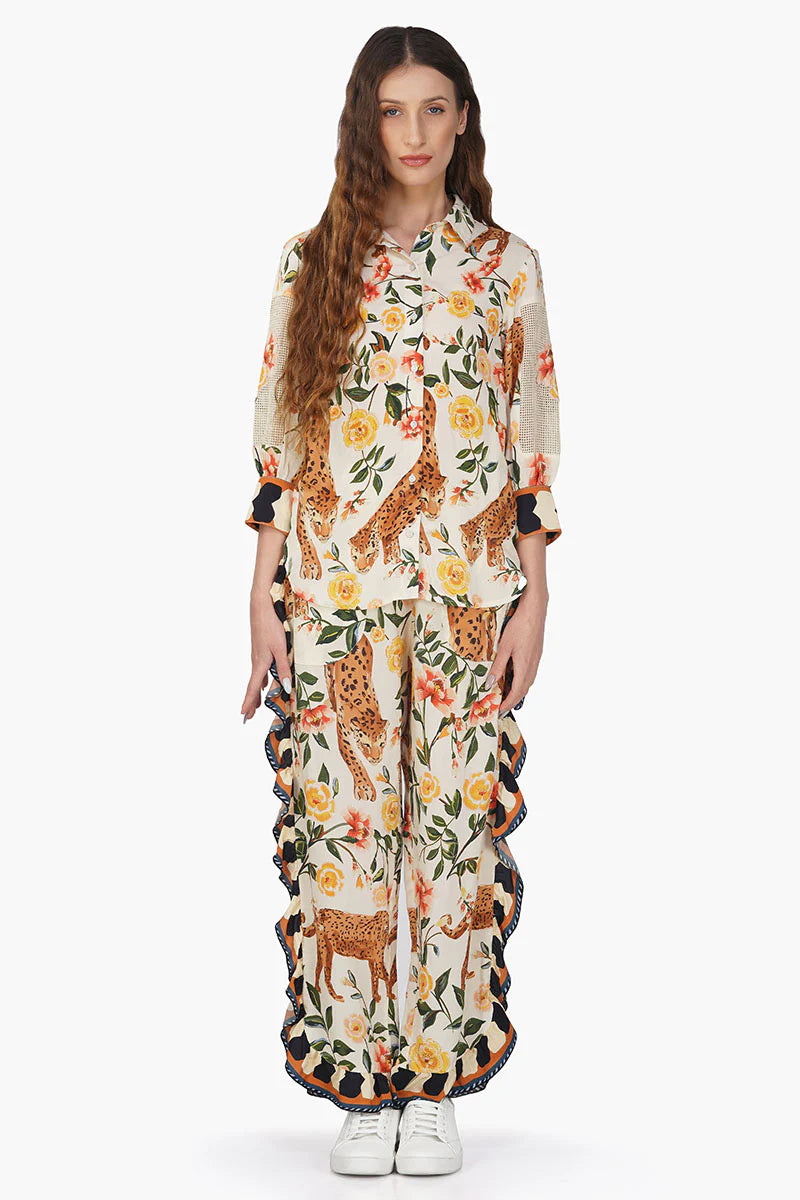 Woman wearing a floral and animal print outfit STMT BOUTIQUE 