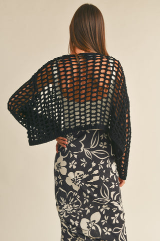  Woman wearing crochet knit crop 