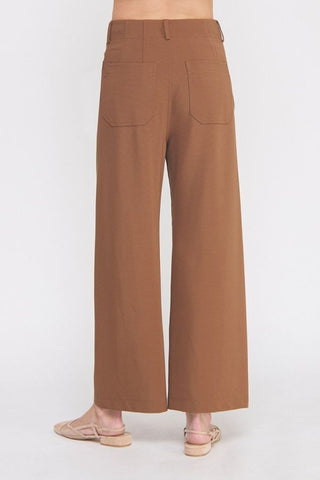 Brown wide-leg pants on a white background