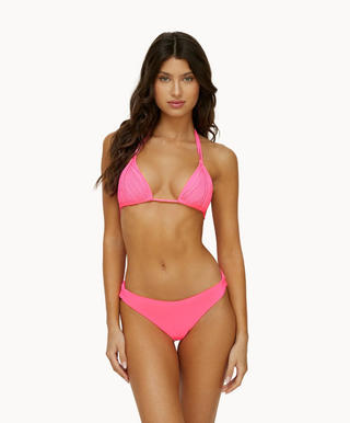 , a stylish and vibrant pink bikini top from the PQ swimwear collection STMT BOUTIQUE 