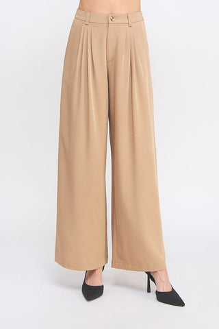 Beige wide-leg pants on a white background
