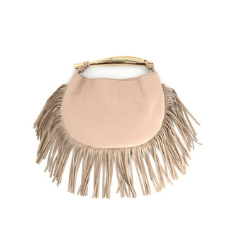 Beige handbag with fringe details on a white background