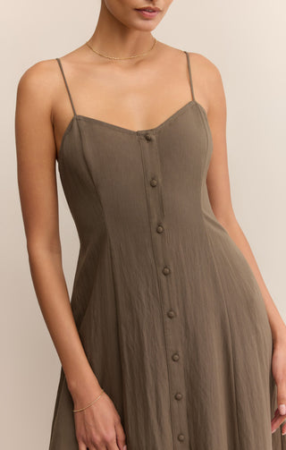  dress side view showing flattering midi length elegant silhouette design