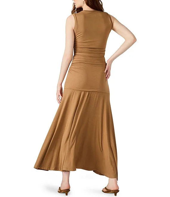 Woman wearing a brown dress on a white background
