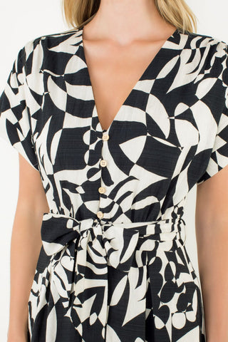 Black and white patterned dress worn by a person