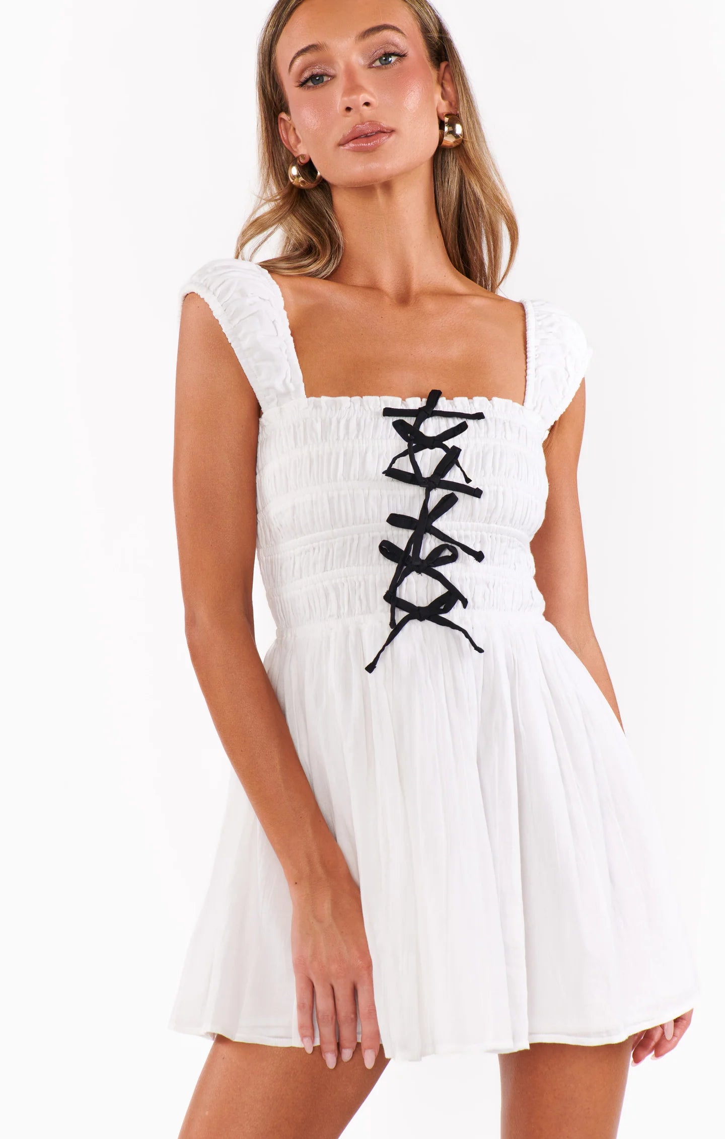 mabel mini dress black bow detail closeup