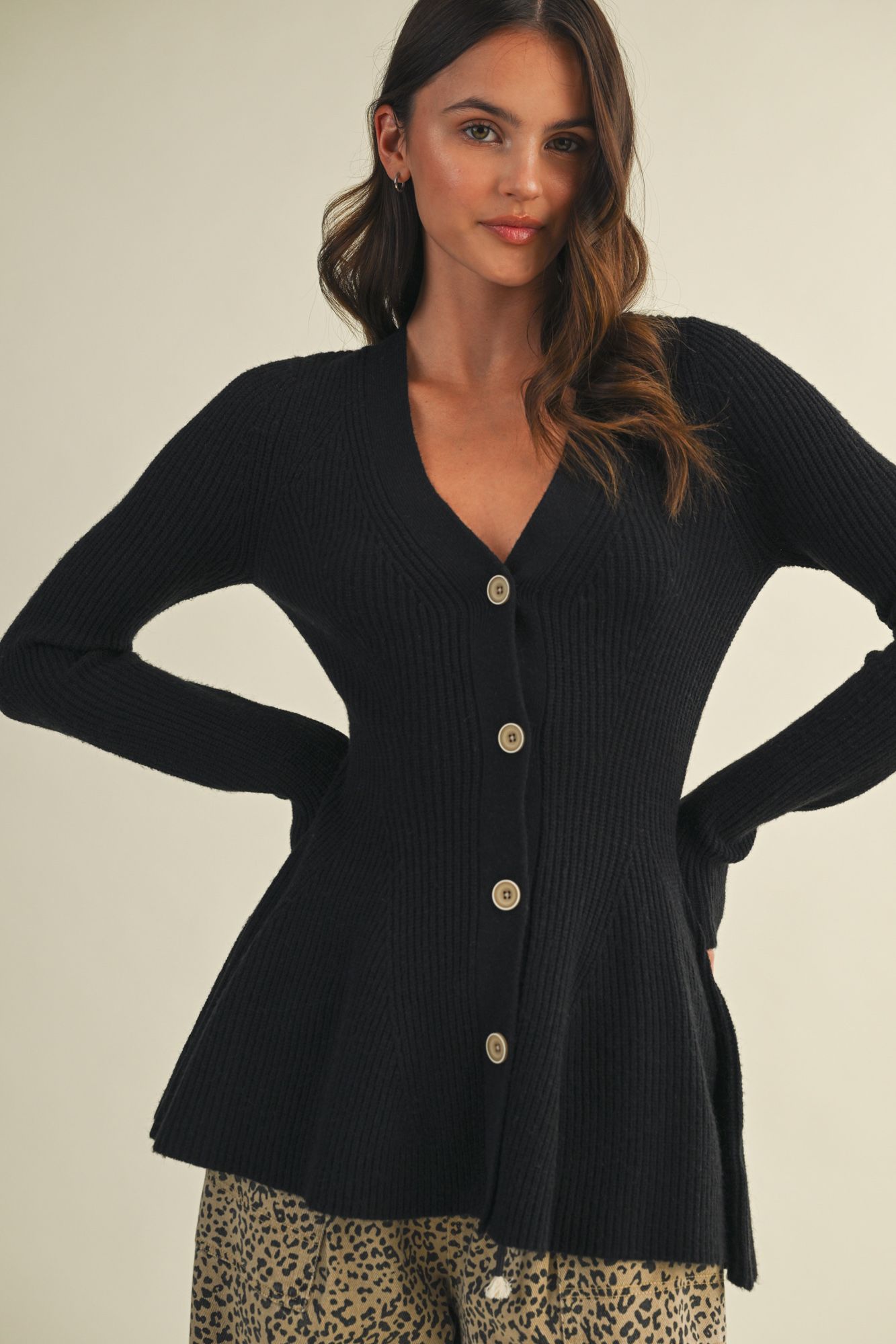 Experience figure-flattering elegance with STMT Boutique's V Neck Hourglass Sweater Cardigan