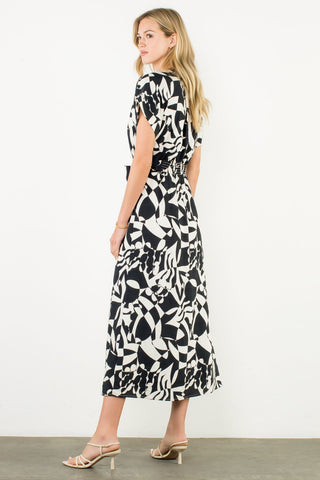 short sleeve button up dress styled with heels elegant vibe