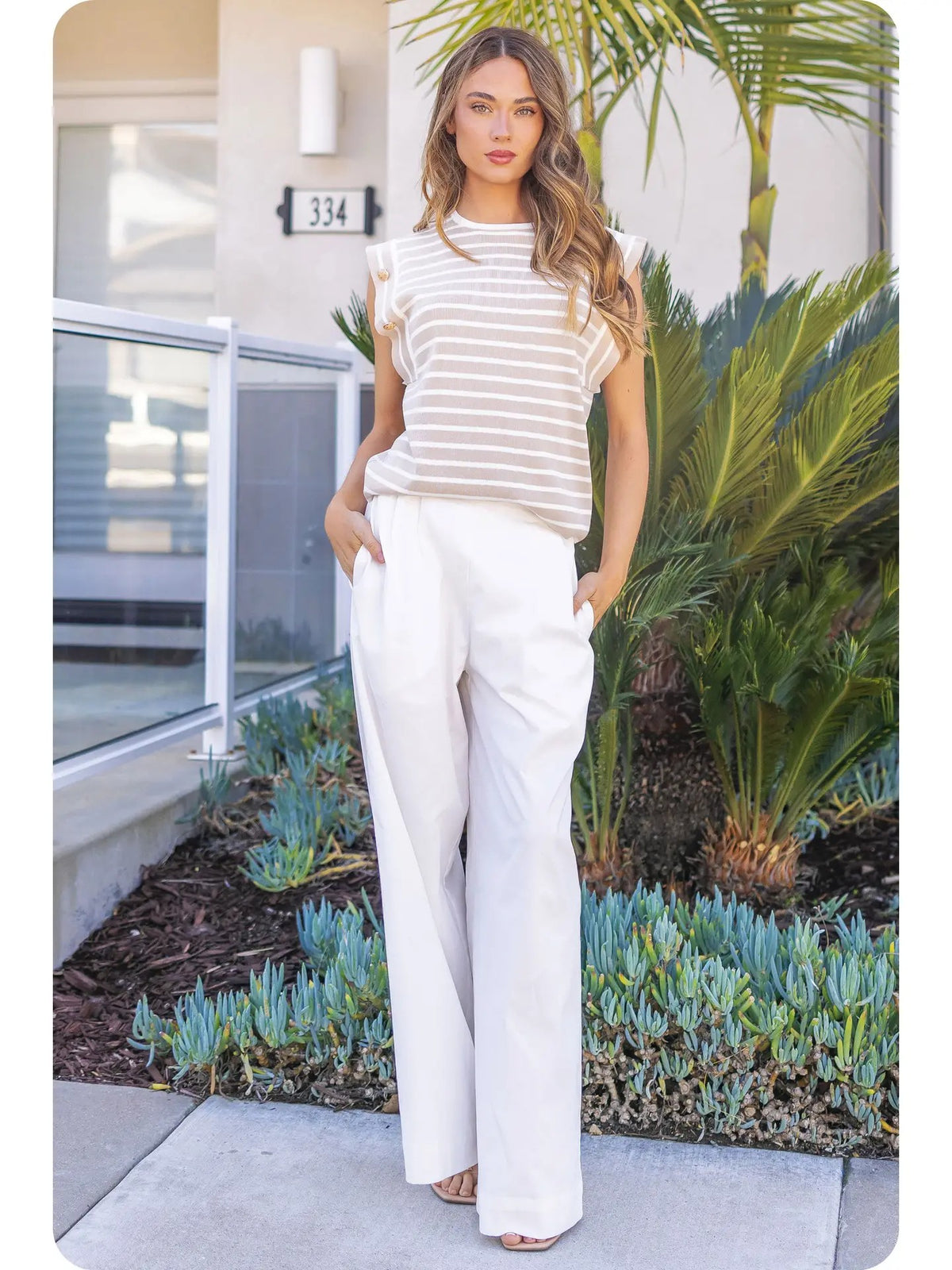 Minimalist styling with STMT BOUTIQUE sleeveless knit top