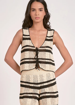 STMT TOP VEST TIE FRONT styled for a chic layered look