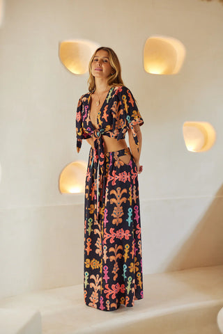 WANDERLUST MAXI SKIRT styled for an elegant vacation-inspired look