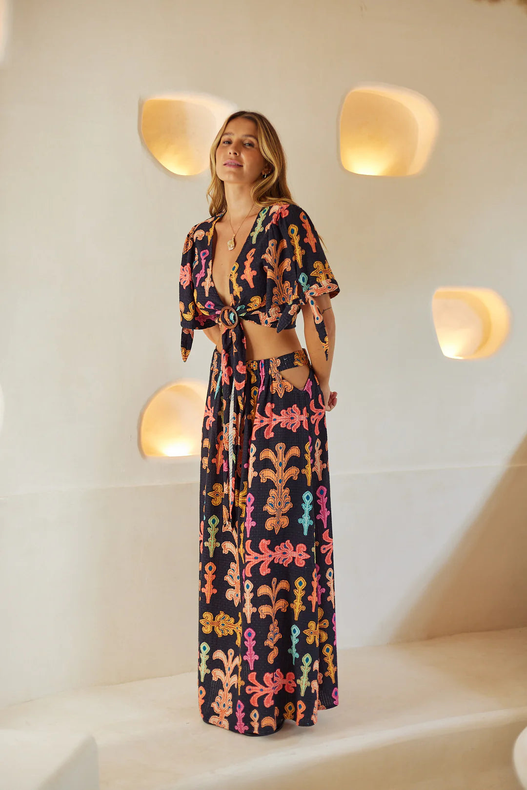 WANDERLUST MAXI SKIRT styled for an elegant vacation-inspired look